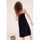 Robe midi en soie coupée en biais avec bretelles spaghetti et décolleté en V doux